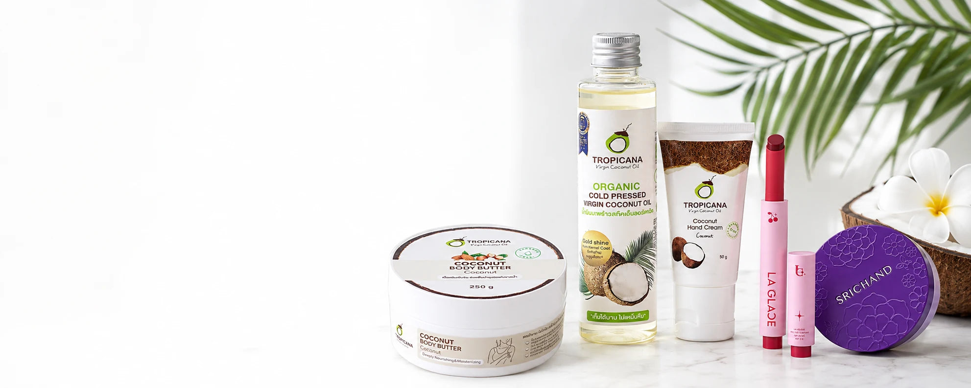 Tropicana coconut body butter, coconut oil and hand cream with La Glace lip colour and Srichand powder